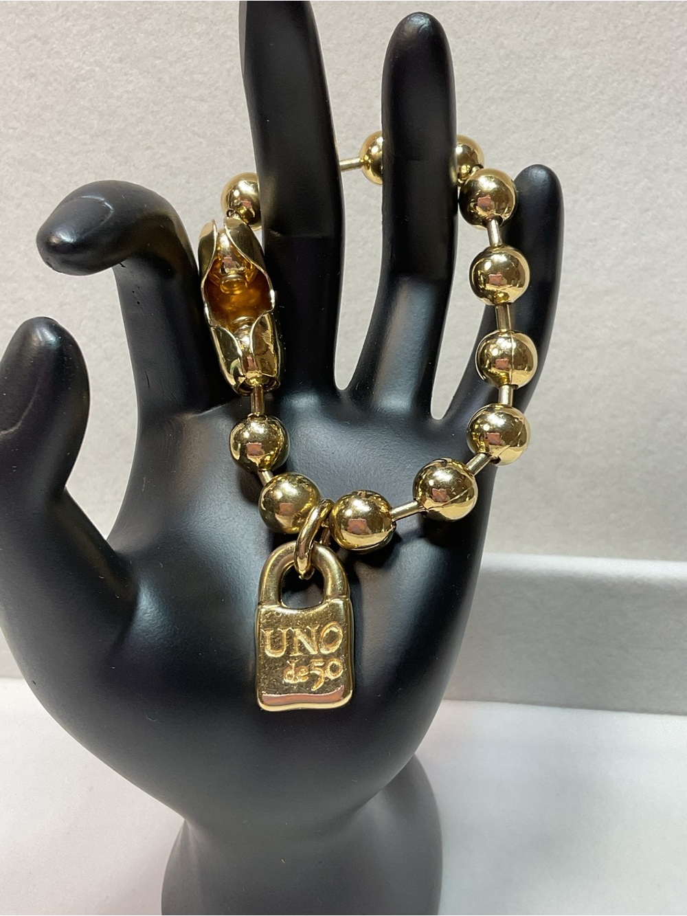 UNO de 50 Gold Bead Bracelet with Padlock Charm